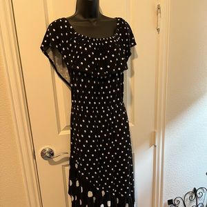 Long black and white polka dotted Sun dress shorter in the front than the back